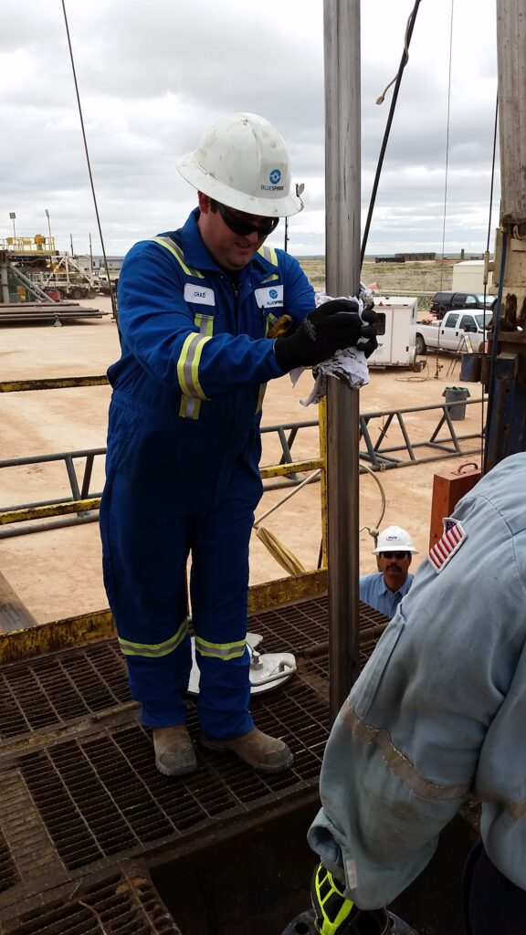 Precision Oil field technician performing well remediation